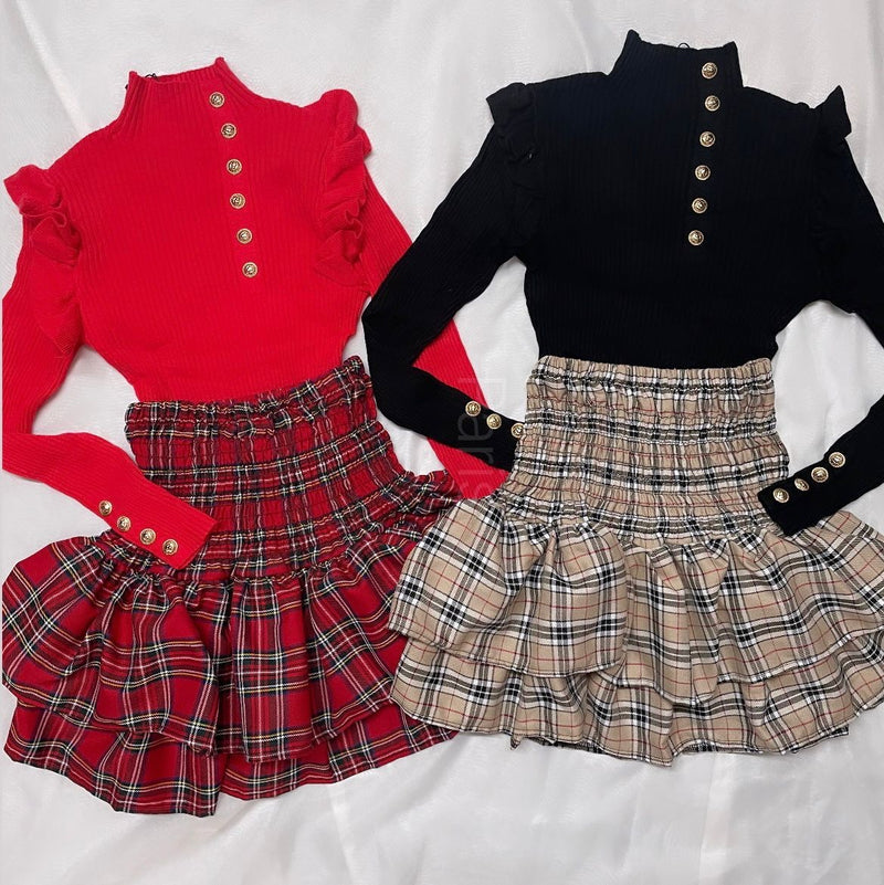 Our Regan ra ra skirts (red tartan or beige print)