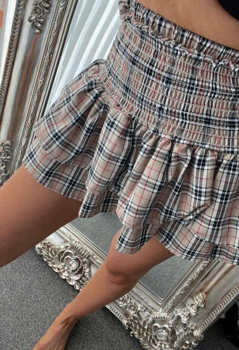 Our Regan ra ra skirts (red tartan or beige print)