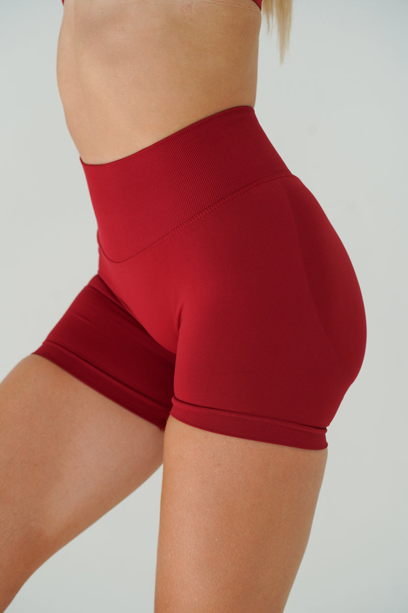 RECOIL HIGH WAIST SCRUNCH SHORTS - DARK RED