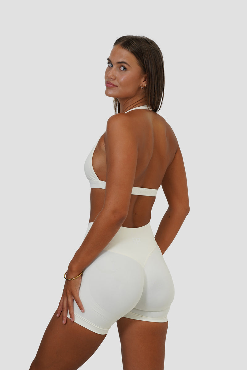 RECOIL HIGH WAIST SCRUNCH SHORTS - OFF WHITE