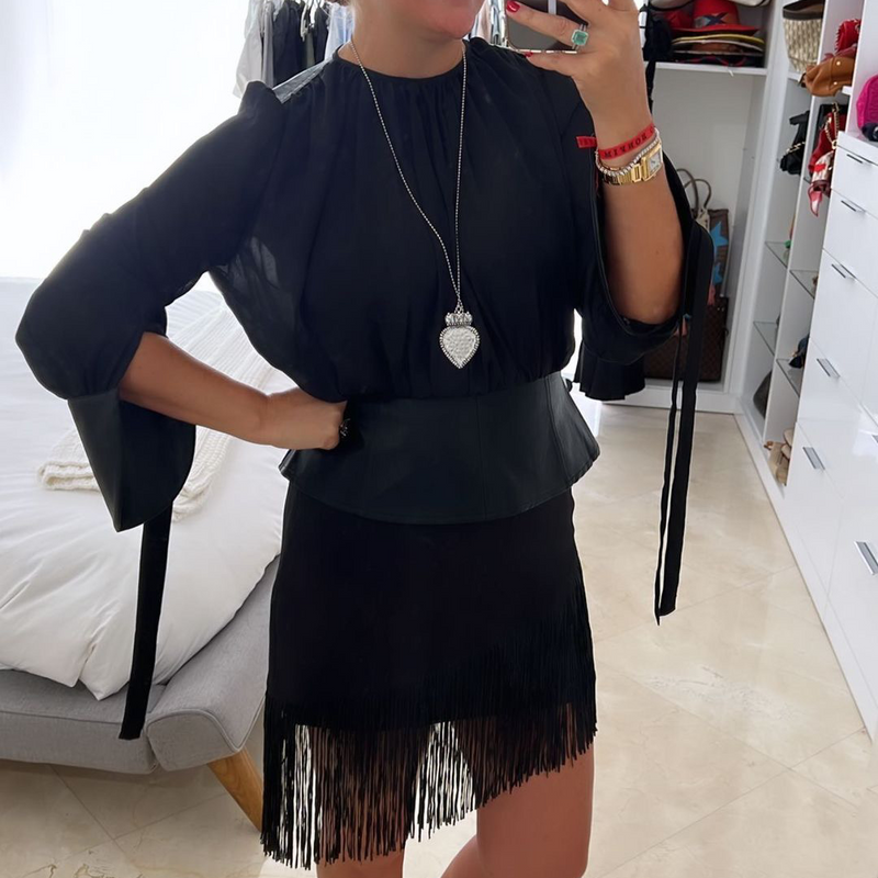 Short skirt with fringes
