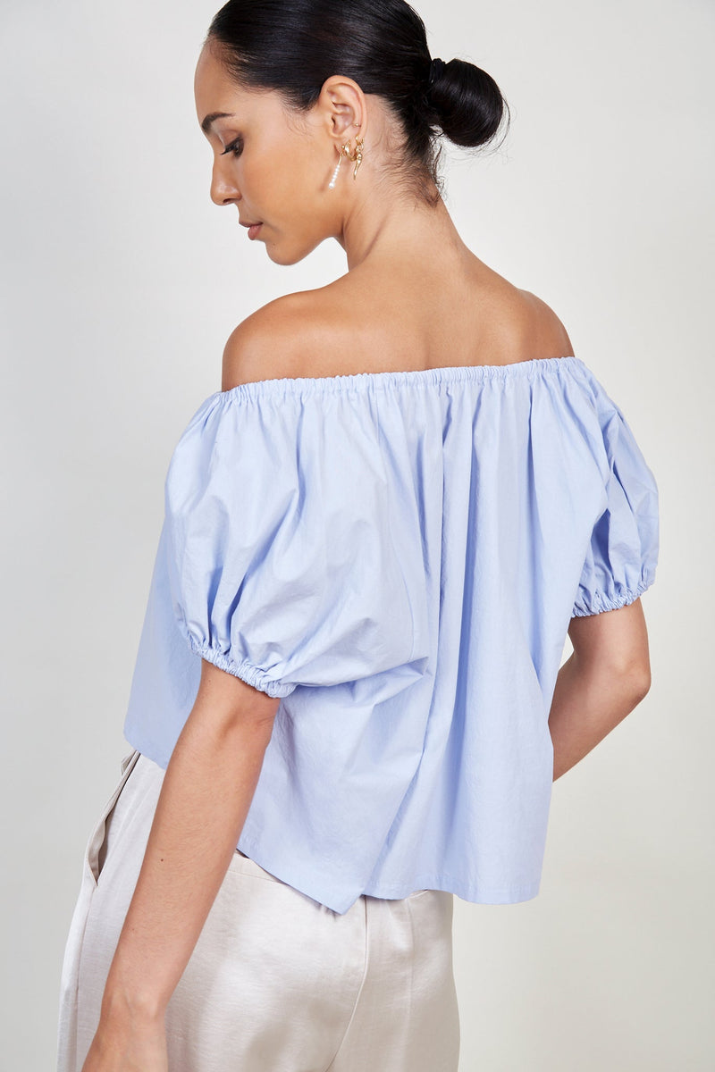Light blue ruched trim off shoulder top