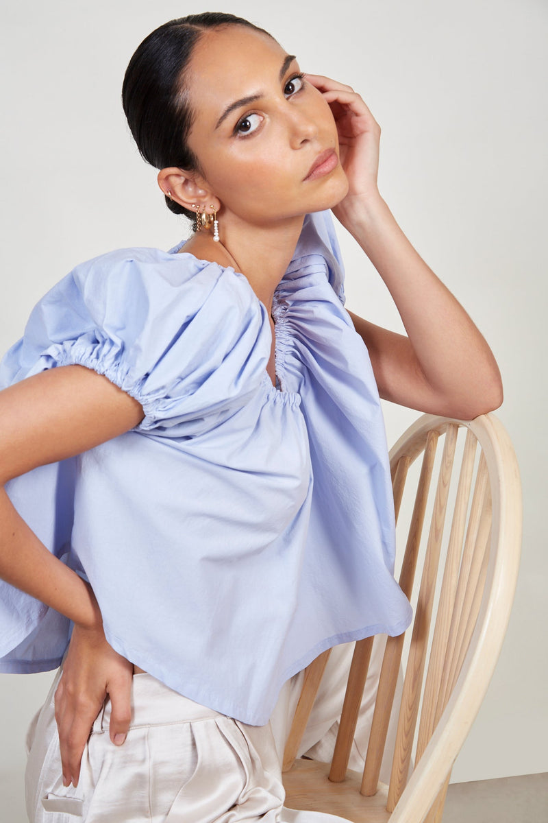 Light blue ruched trim off shoulder top