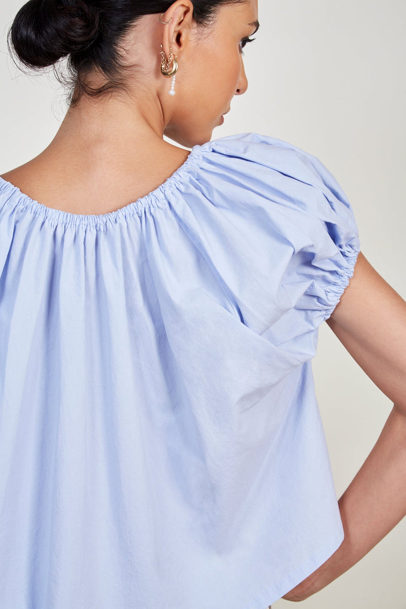 Light blue ruched trim off shoulder top