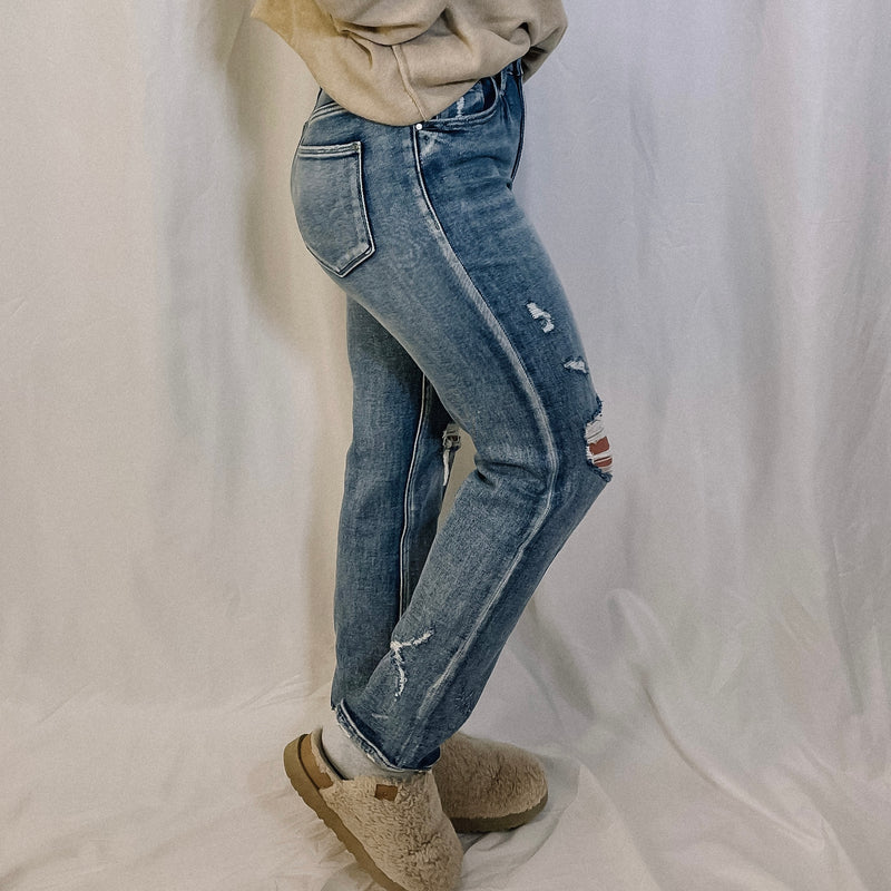 Logan Distressed Slim Straight Leg Denim