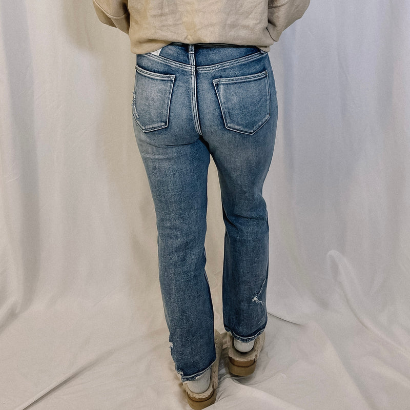Logan Distressed Slim Straight Leg Denim